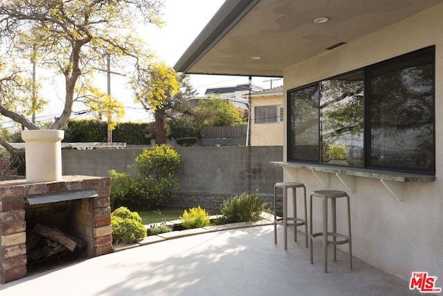 view of patio featuring a bar