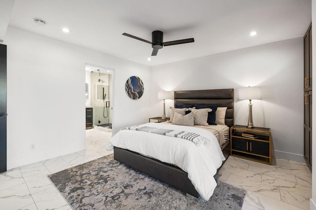 bedroom featuring ceiling fan and ensuite bath