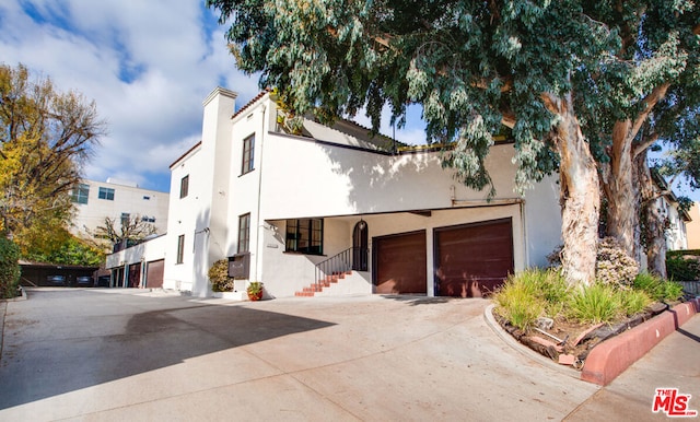 view of front of property with a garage