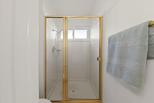 bathroom featuring an enclosed shower