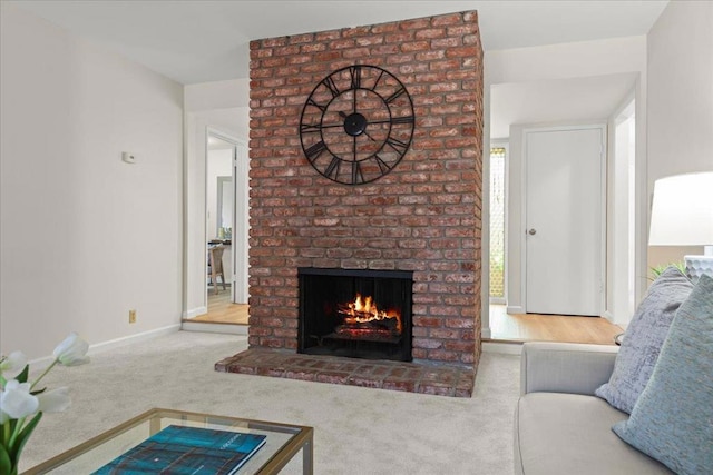 carpeted living room featuring a brick fireplace