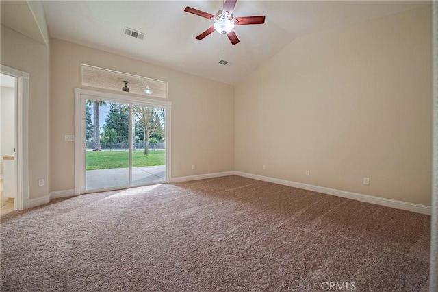 unfurnished room with vaulted ceiling, ceiling fan, and carpet floors