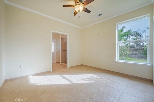 spare room with light tile patterned flooring, ceiling fan, and ornamental molding