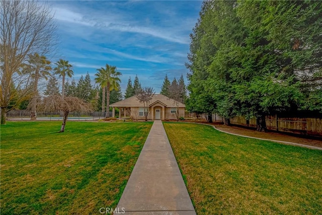 view of front of home with a front yard