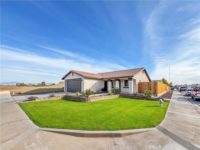 ranch-style house with a garage and a front yard