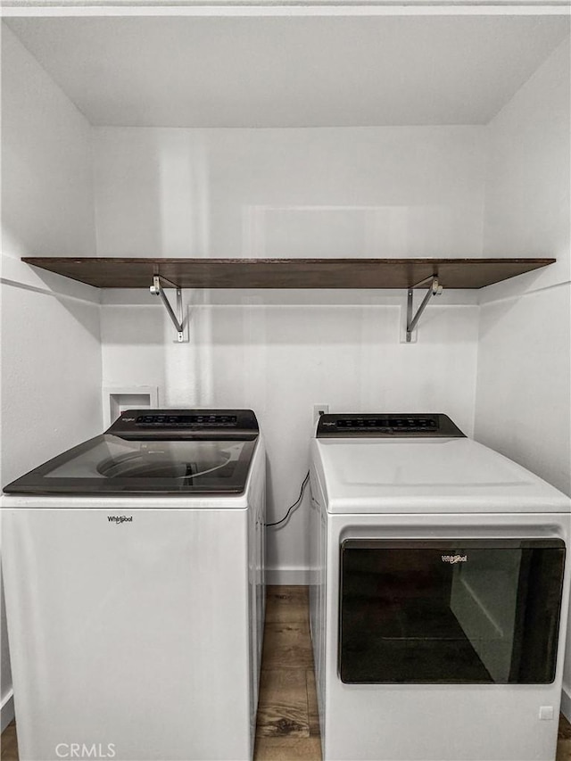 laundry room with washer and clothes dryer