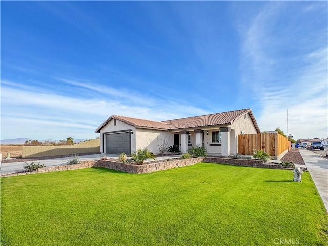 ranch-style house with a garage and a front yard