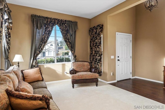 sitting room featuring dark wood-type flooring