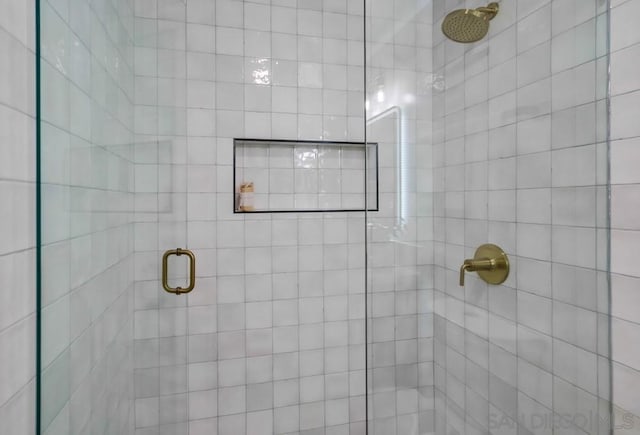 bathroom featuring an enclosed shower