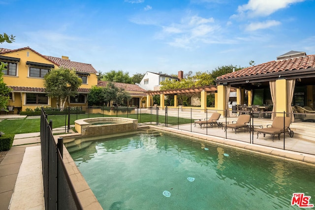 view of swimming pool with a pergola, a patio area, and an in ground hot tub