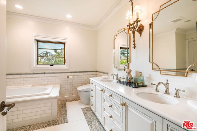 bathroom with ornamental molding, toilet, tile patterned flooring, and vanity