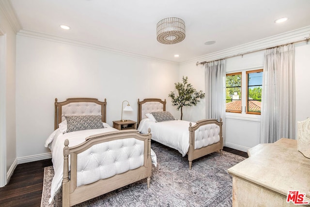 bedroom with dark wood-type flooring and ornamental molding