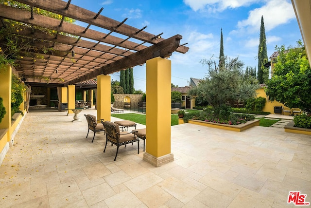 view of patio / terrace featuring a pergola