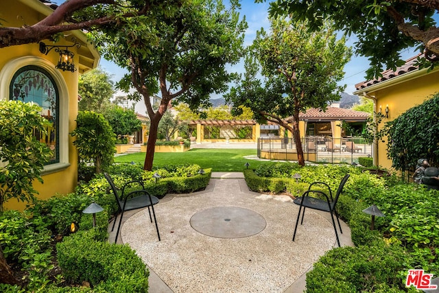 view of patio / terrace featuring a pergola