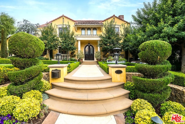 view of front facade featuring french doors