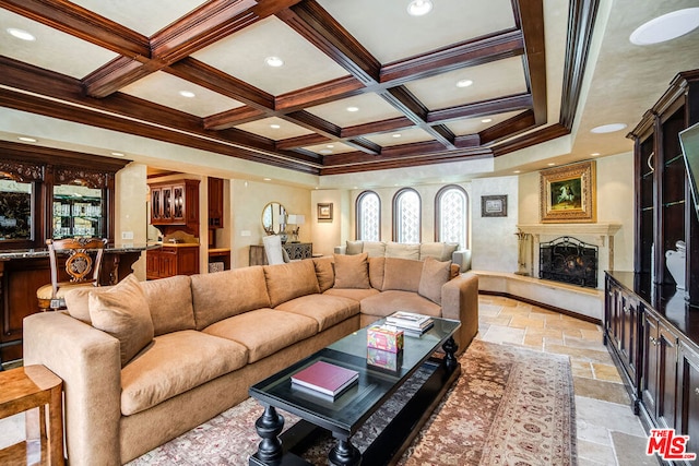 living room featuring coffered ceiling, crown molding, indoor bar, beamed ceiling, and a fireplace