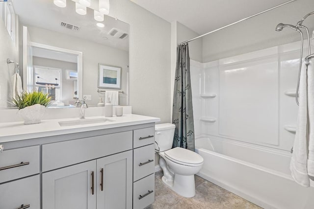 full bathroom featuring vanity, toilet, and shower / bath combo with shower curtain