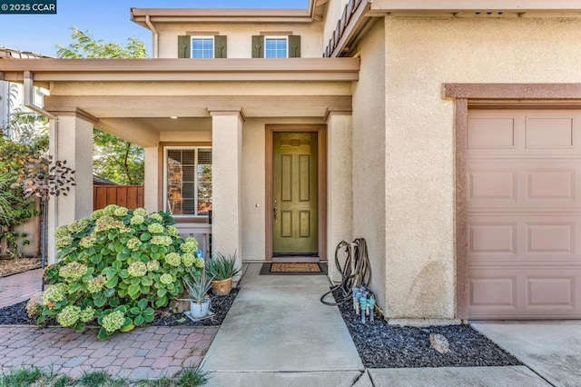 property entrance featuring a garage