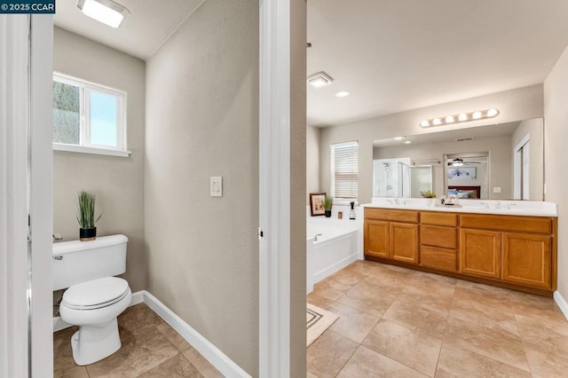 full bathroom featuring ceiling fan, vanity, tile patterned floors, independent shower and bath, and toilet