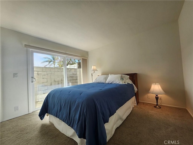 bedroom featuring carpet floors and access to outside