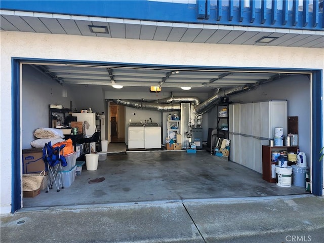 garage with separate washer and dryer