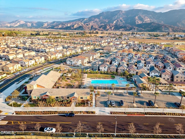 drone / aerial view featuring a residential view and a mountain view