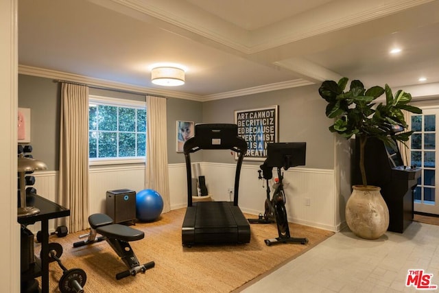 exercise area featuring ornamental molding