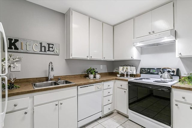 kitchen featuring electric stove, sink, light tile patterned floors, white dishwasher, and white cabinets