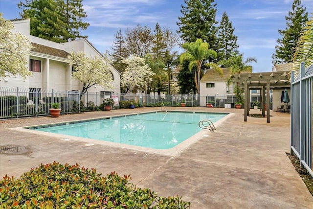 view of swimming pool with a pergola and a patio area