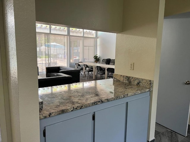 kitchen with stone countertops