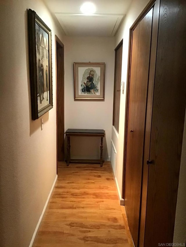 hallway featuring light wood-type flooring