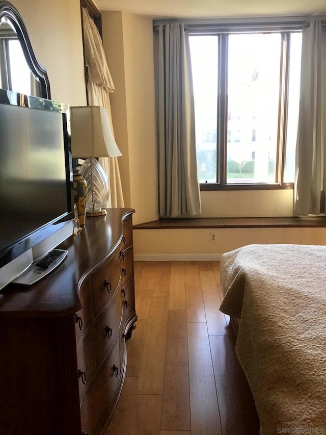 bedroom featuring hardwood / wood-style floors