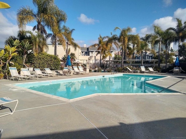 view of swimming pool with a patio area