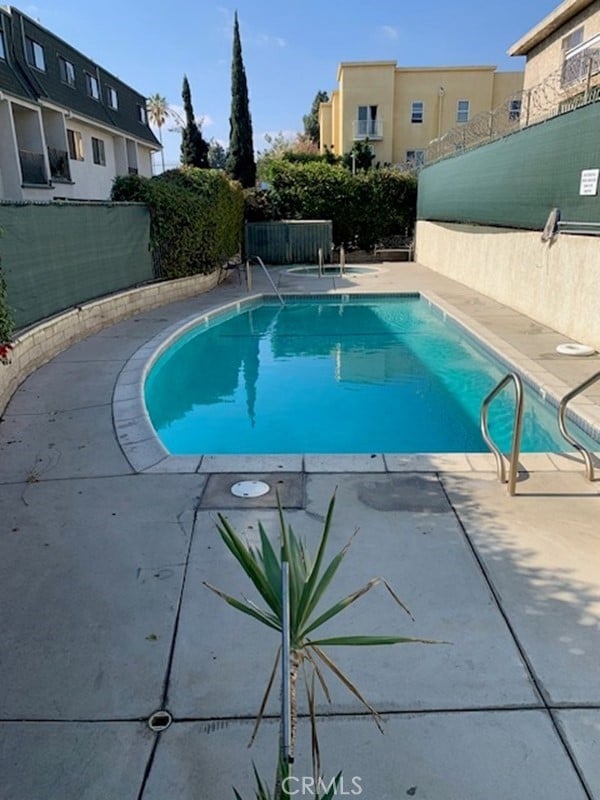 view of pool with a patio area