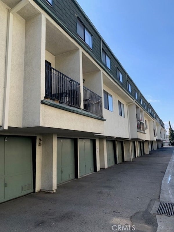 view of building exterior featuring a garage