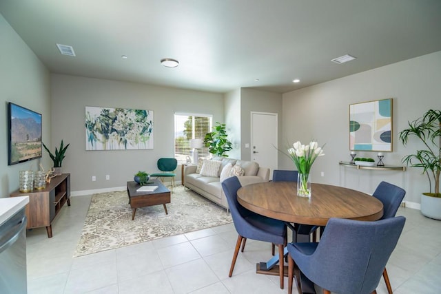 dining room featuring light tile patterned flooring