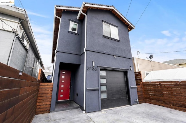 view of front of property featuring a garage