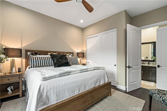 bedroom with a ceiling fan, wood finished floors, ensuite bathroom, a closet, and recessed lighting