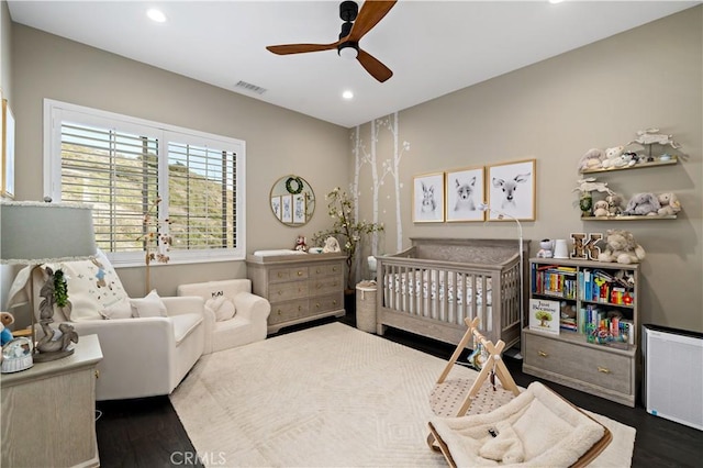 bedroom with dark wood-type flooring, recessed lighting, visible vents, and a ceiling fan