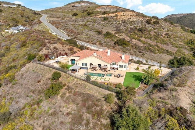 bird's eye view with a mountain view