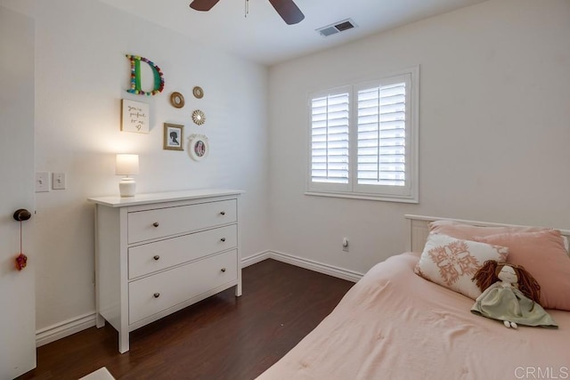 bedroom with dark wood-type flooring and ceiling fan