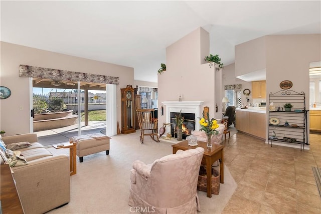 living room with high vaulted ceiling