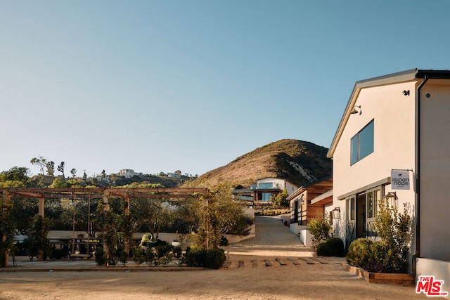 view of community with a mountain view