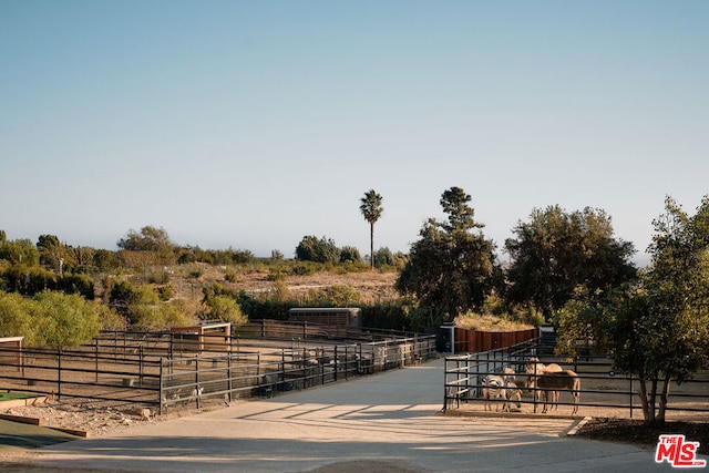 exterior space with a rural view