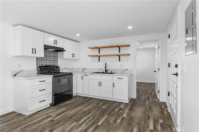 kitchen featuring white cabinetry, dark hardwood / wood-style floors, black electric range oven, and sink