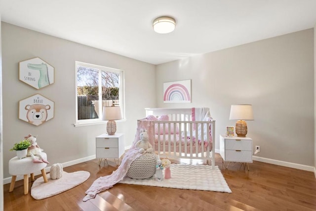 bedroom featuring hardwood / wood-style flooring