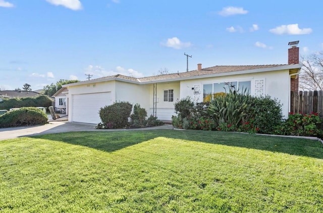 ranch-style house featuring a garage and a front yard