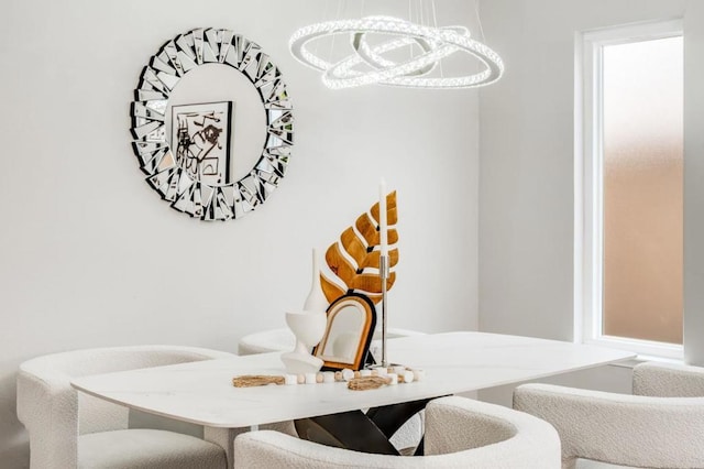 dining area featuring a chandelier