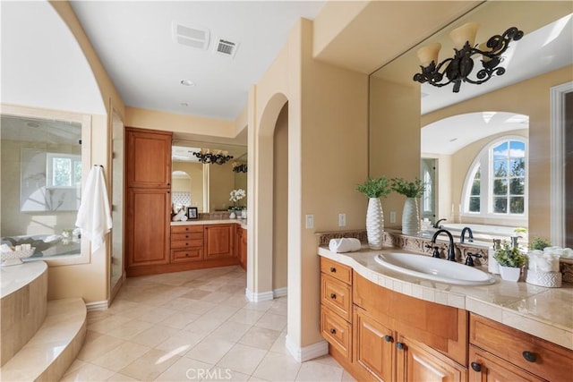 bathroom featuring vanity and tile patterned flooring