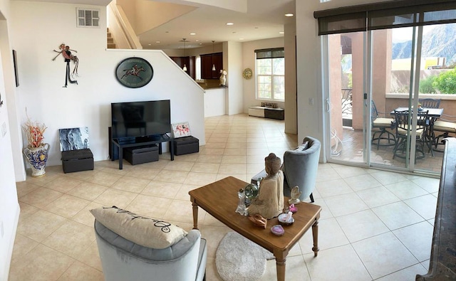 living room featuring light tile patterned floors